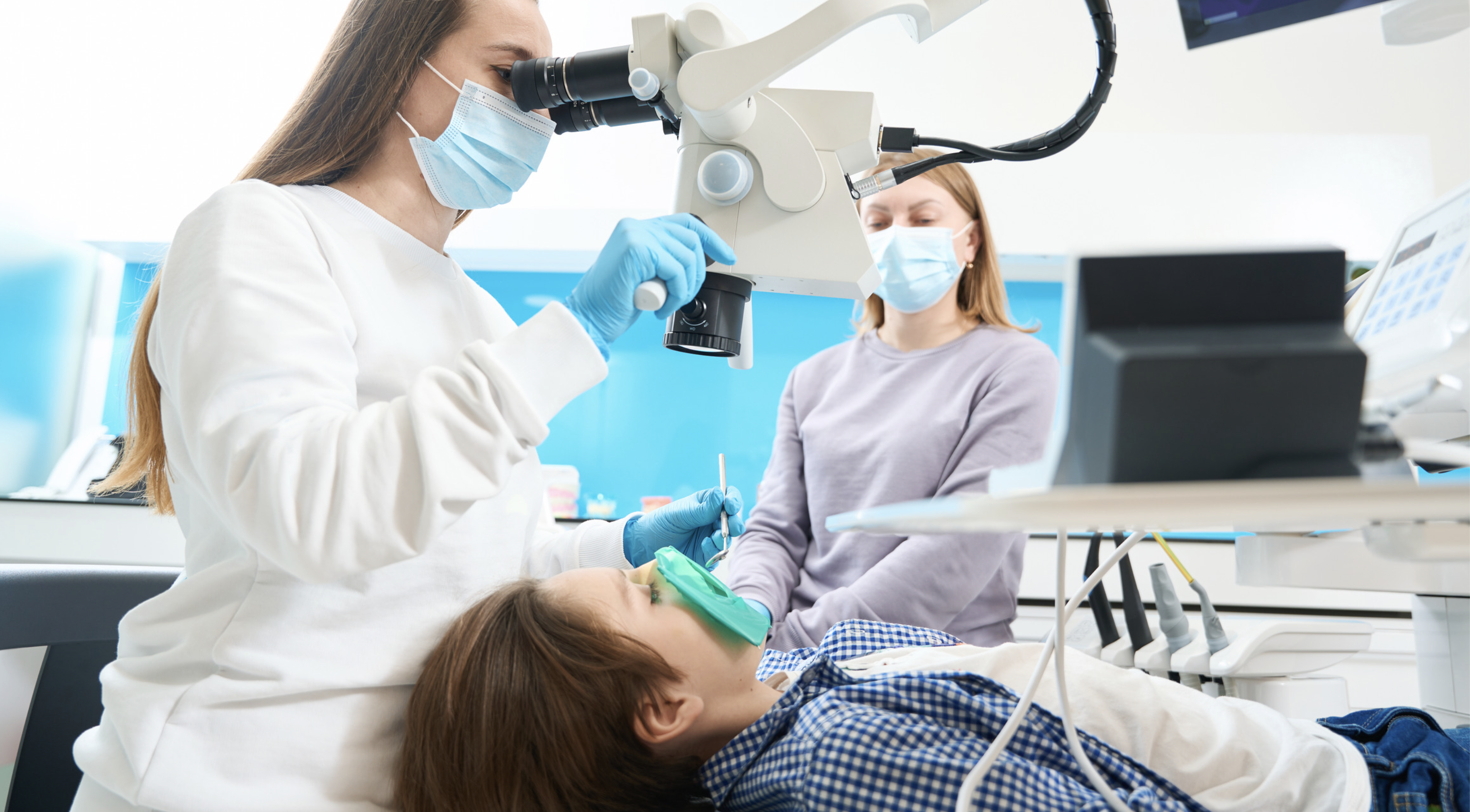 A dental specialist quietly carrying out the root canal treatment steps in a calm setting